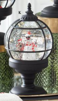 K&K Interiors 9.5" Black Grid Snowman Water Spinning LED Snow Globe with Timer