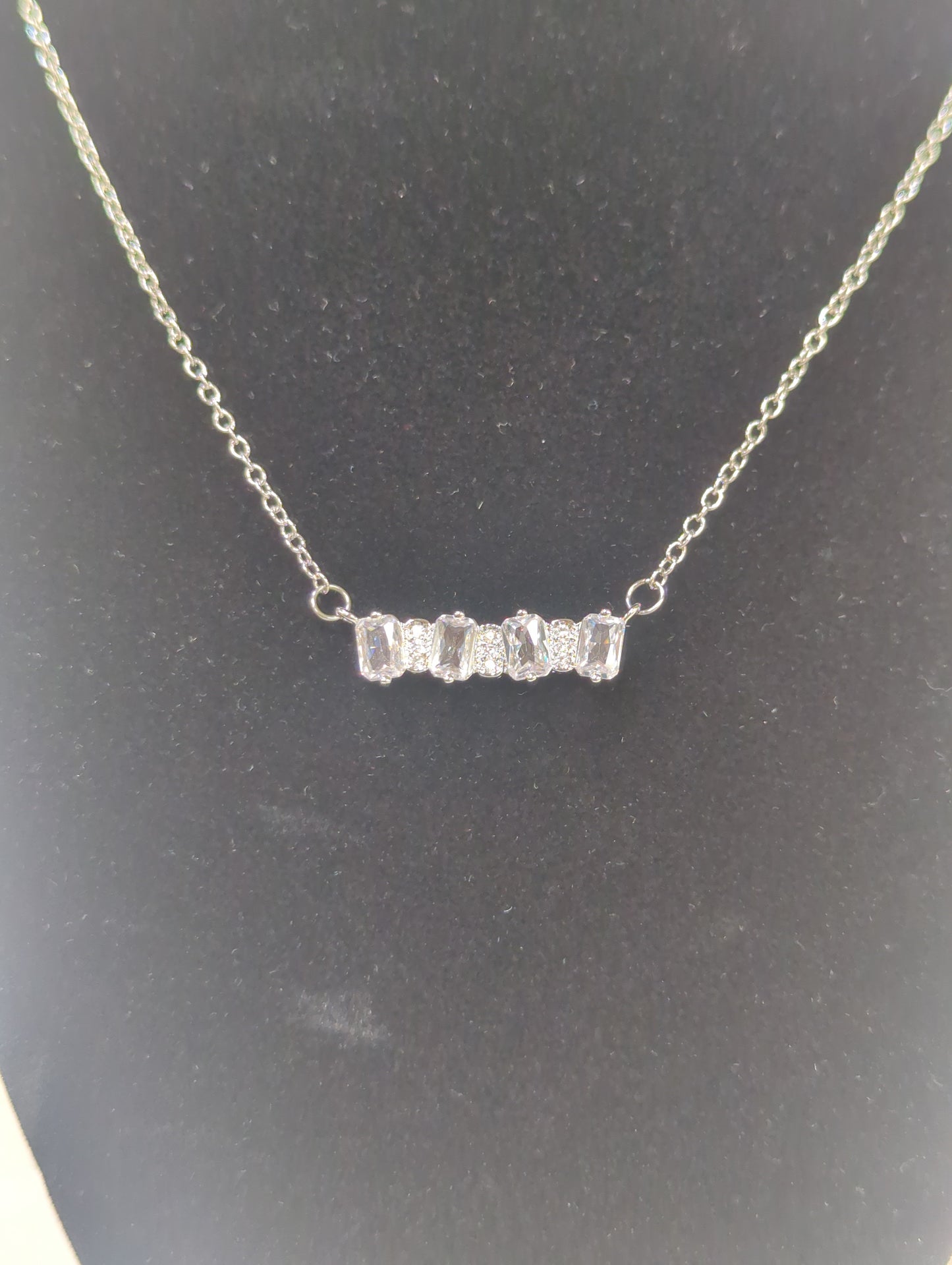 MEGHAN BROWNE CIO SILVER NECKLACE
