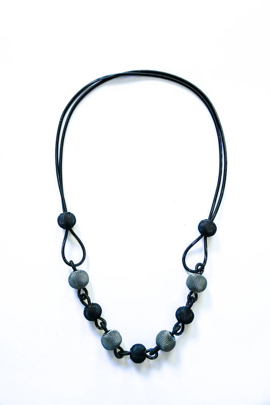 SEA LILY LONG WIRE NECKLACE WITH BLACK AND SILVER MESH BALLS