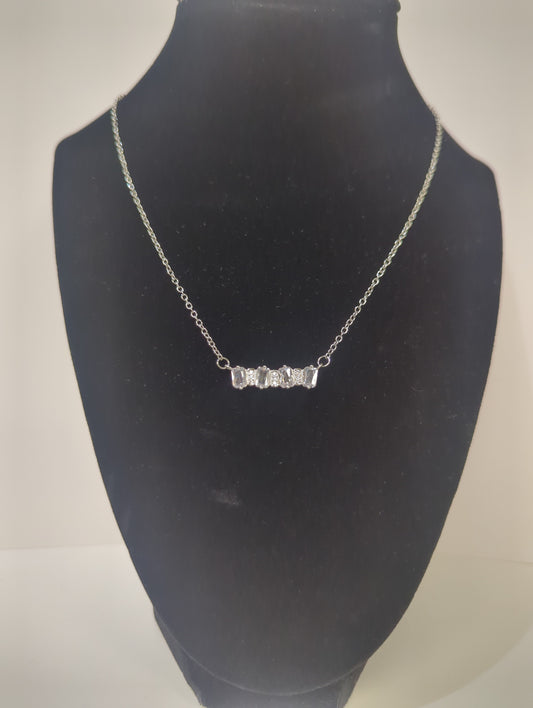 MEGHAN BROWNE CIO SILVER NECKLACE