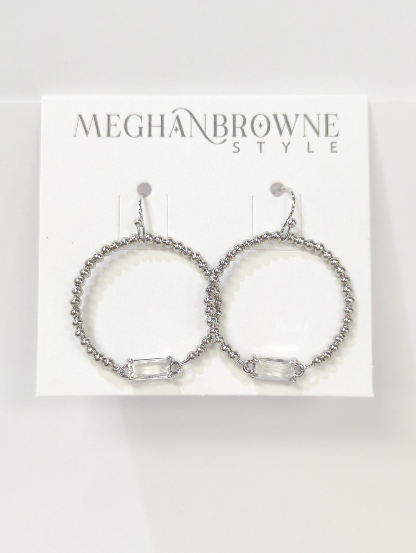 MEGHAN BROWNE SAWYER SILVER CLEAR EARRINGS