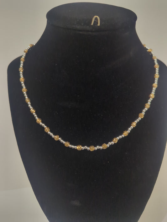 MEGHAN BROWNE FIN GOLD AND SILVER NECKLACE